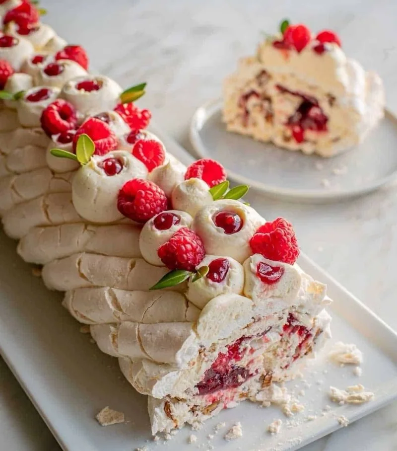 Pistachio raspberry meringue roulade