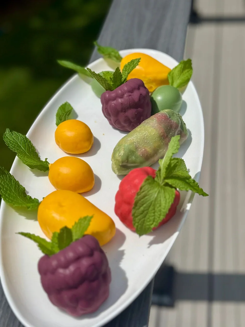 Fruit-shaped pastries on a long serving platter